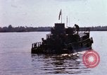 Image of Brown Water Navy Dong Tam Vietnam, 1967, second 10 stock footage video 65675025929