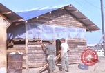 Image of Soldiers building a mess hall Vietnam, 1967, second 1 stock footage video 65675025930