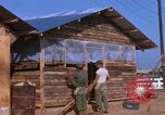 Image of Soldiers building a mess hall Vietnam, 1967, second 3 stock footage video 65675025930