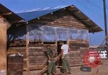 Image of Soldiers building a mess hall Vietnam, 1967, second 4 stock footage video 65675025930