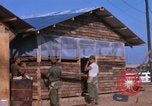 Image of Soldiers building a mess hall Vietnam, 1967, second 7 stock footage video 65675025930