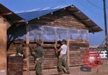 Image of Soldiers building a mess hall Vietnam, 1967, second 9 stock footage video 65675025930