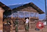 Image of Soldiers building a mess hall Vietnam, 1967, second 11 stock footage video 65675025930