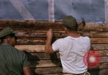 Image of Soldiers building a mess hall Vietnam, 1967, second 12 stock footage video 65675025930