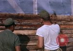 Image of Soldiers building a mess hall Vietnam, 1967, second 13 stock footage video 65675025930