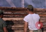 Image of Soldiers building a mess hall Vietnam, 1967, second 17 stock footage video 65675025930