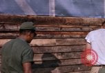 Image of Soldiers building a mess hall Vietnam, 1967, second 18 stock footage video 65675025930