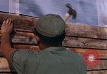 Image of Soldiers building a mess hall Vietnam, 1967, second 20 stock footage video 65675025930