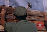 Image of Soldiers building a mess hall Vietnam, 1967, second 21 stock footage video 65675025930