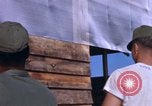 Image of Soldiers building a mess hall Vietnam, 1967, second 25 stock footage video 65675025930
