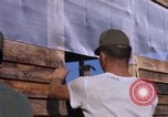 Image of Soldiers building a mess hall Vietnam, 1967, second 26 stock footage video 65675025930