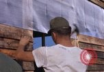 Image of Soldiers building a mess hall Vietnam, 1967, second 27 stock footage video 65675025930