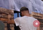 Image of Soldiers building a mess hall Vietnam, 1967, second 30 stock footage video 65675025930