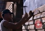 Image of Soldiers building a mess hall Vietnam, 1967, second 31 stock footage video 65675025930