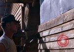 Image of Soldiers building a mess hall Vietnam, 1967, second 33 stock footage video 65675025930