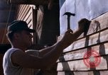 Image of Soldiers building a mess hall Vietnam, 1967, second 35 stock footage video 65675025930