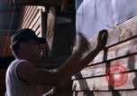 Image of Soldiers building a mess hall Vietnam, 1967, second 36 stock footage video 65675025930