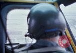 Image of helicopters land Vietnam, 1969, second 13 stock footage video 65675025966
