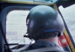 Image of helicopters land Vietnam, 1969, second 14 stock footage video 65675025966