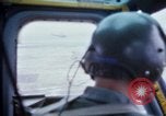 Image of helicopters land Vietnam, 1969, second 16 stock footage video 65675025966