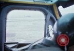 Image of helicopters land Vietnam, 1969, second 17 stock footage video 65675025966