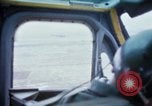 Image of helicopters land Vietnam, 1969, second 18 stock footage video 65675025966