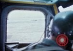 Image of helicopters land Vietnam, 1969, second 19 stock footage video 65675025966