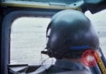 Image of helicopters land Vietnam, 1969, second 21 stock footage video 65675025966