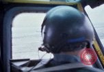 Image of helicopters land Vietnam, 1969, second 23 stock footage video 65675025966