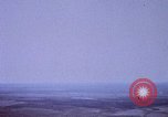 Image of helicopters land Vietnam, 1969, second 52 stock footage video 65675025966