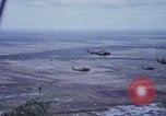Image of UH-1H helicopters in Mekong Delta of Vietnam Vietnam, 1969, second 6 stock footage video 65675025967