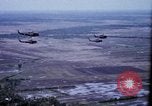 Image of UH-1H helicopters in Mekong Delta of Vietnam Vietnam, 1969, second 13 stock footage video 65675025967
