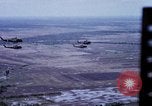 Image of UH-1H helicopters in Mekong Delta of Vietnam Vietnam, 1969, second 14 stock footage video 65675025967