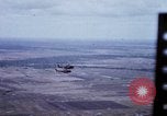 Image of UH-1H helicopters in Mekong Delta of Vietnam Vietnam, 1969, second 16 stock footage video 65675025967