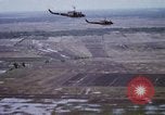 Image of UH-1H helicopters in Mekong Delta of Vietnam Vietnam, 1969, second 21 stock footage video 65675025967