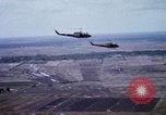 Image of UH-1H helicopters in Mekong Delta of Vietnam Vietnam, 1969, second 25 stock footage video 65675025967