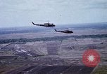 Image of UH-1H helicopters in Mekong Delta of Vietnam Vietnam, 1969, second 26 stock footage video 65675025967