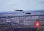 Image of UH-1H helicopters in Mekong Delta of Vietnam Vietnam, 1969, second 27 stock footage video 65675025967