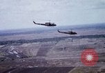 Image of UH-1H helicopters in Mekong Delta of Vietnam Vietnam, 1969, second 31 stock footage video 65675025967