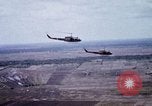 Image of UH-1H helicopters in Mekong Delta of Vietnam Vietnam, 1969, second 32 stock footage video 65675025967
