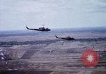 Image of UH-1H helicopters in Mekong Delta of Vietnam Vietnam, 1969, second 34 stock footage video 65675025967
