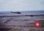 Image of UH-1H helicopters in Mekong Delta of Vietnam Vietnam, 1969, second 38 stock footage video 65675025967