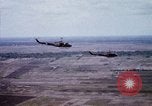 Image of UH-1H helicopters in Mekong Delta of Vietnam Vietnam, 1969, second 39 stock footage video 65675025967