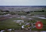 Image of UH-1H helicopters in Mekong Delta of Vietnam Vietnam, 1969, second 42 stock footage video 65675025967