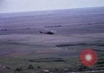 Image of UH-1H helicopters in Mekong Delta of Vietnam Vietnam, 1969, second 60 stock footage video 65675025967