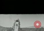 Image of women bathers sliding headfirst down a slide into a lake United States USA, 1940, second 1 stock footage video 65675026047