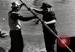 Standbild Männer japanischer Abstammung die angeln United States USA, 1942, aus Sekunde 24 historischem Filmmaterial Videoclip 65675026120