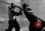 Standbild Männer japanischer Abstammung die angeln United States USA, 1942, aus Sekunde 25 historischem Filmmaterial Videoclip 65675026120