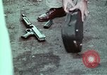 Immagine di Nascosto armi da fuoco illegali e laboratorio presso l' Ufficio di presidenza di alcool e T United States USA, 1961, secondo 31 filmato di repertorio 65675026150