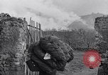Image of people evacuating during Mount Vesuvius eruption Naples Italy, 1944, second 57 stock footage video 65675026169